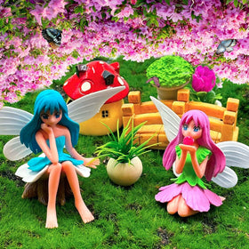 Suartus pink dress fairy figurine adds whimsy to planters and terrariums.