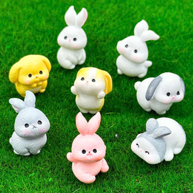 Suartus resin bunny miniatures in varied poses for fairy gardens and crafts