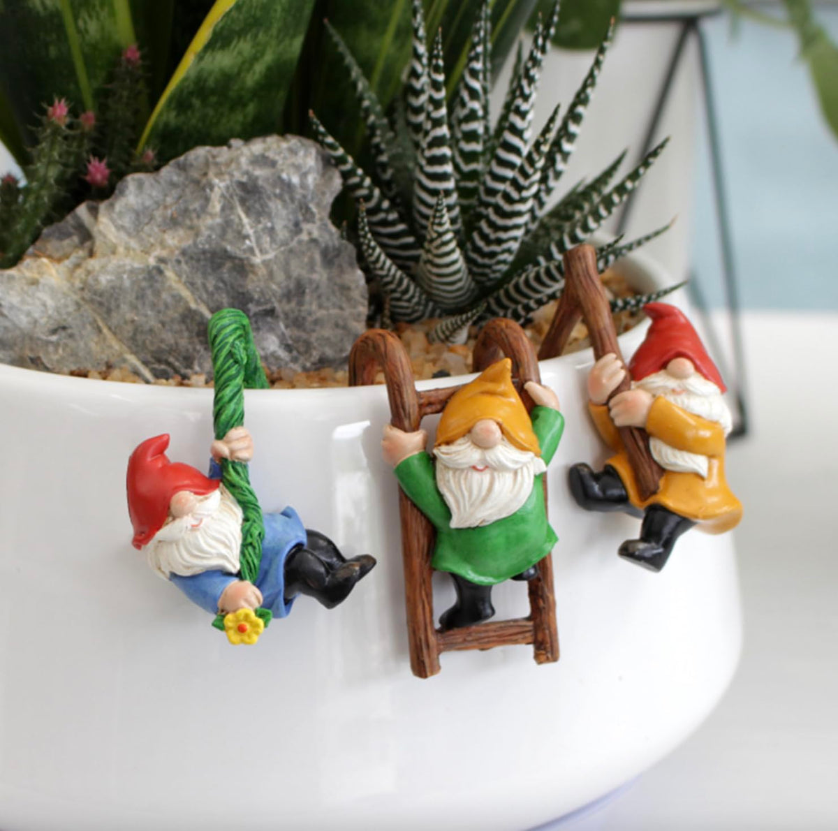Summerdate gnome figurines on desk brighten workspace