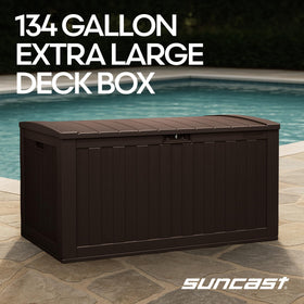 Suncast 134-gal deck box lid open reveals easy access to cushions.