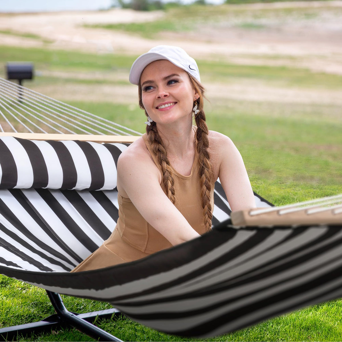 SUNCREAT hammock with hardwood spreader bar provides stable, stylish support.
