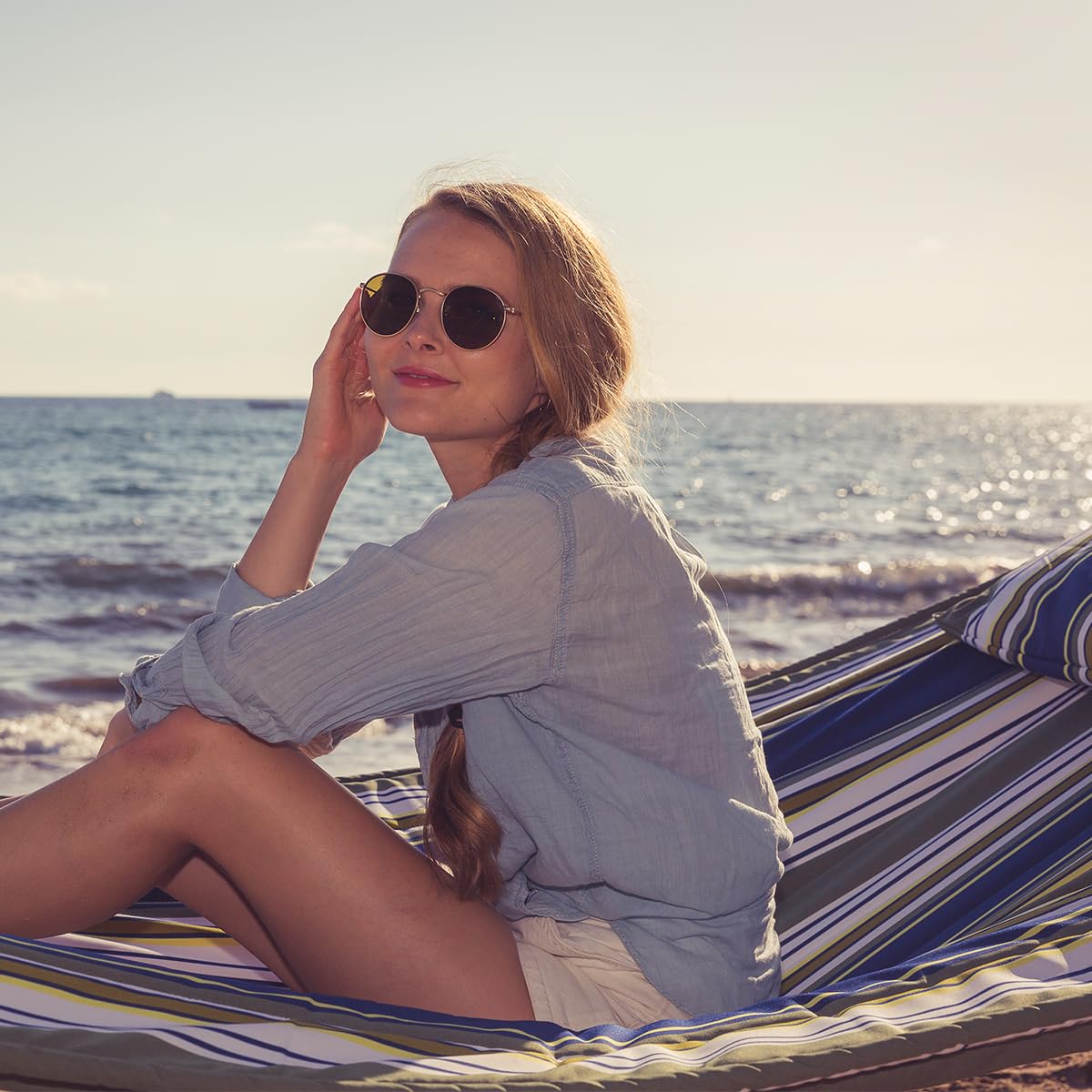 SUNCREAT head pillow adds plush comfort for lounging outside.