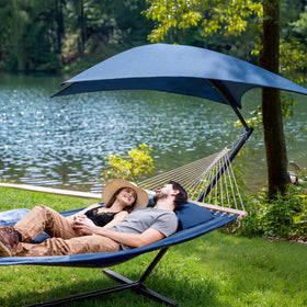 SUNCREAT hammock canopy provides sun protection for lounging.