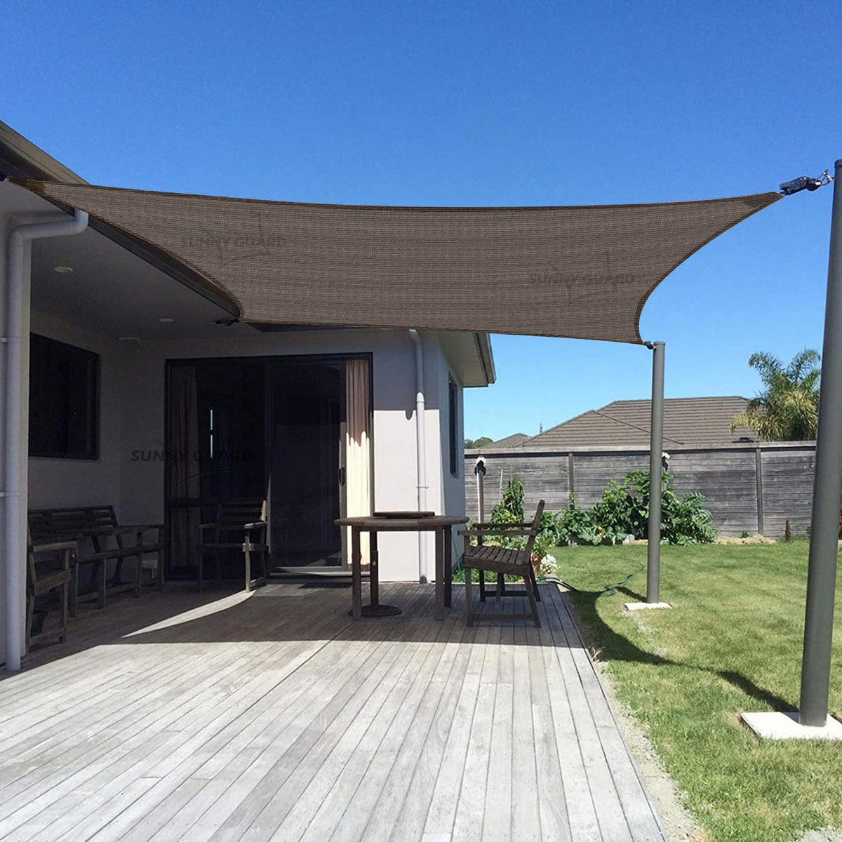 Sunny Guard sun shade rectangle 10x13 in brown blocks UV rays while cooling outdoor space.