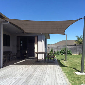 Sunny Guard sun shade rectangle 10x13 in brown blocks UV rays while cooling outdoor space.