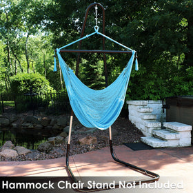 Sky blue Sunnydaze chair creates a relaxing reading corner in any space.
