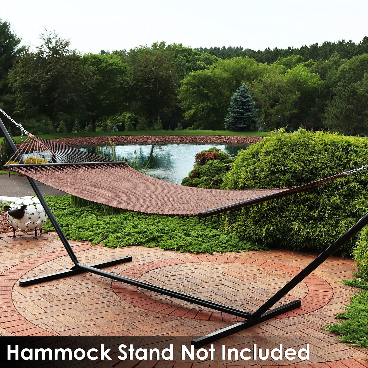 Sunnydaze Decor mocha hammock adds warm, natural aesthetic.