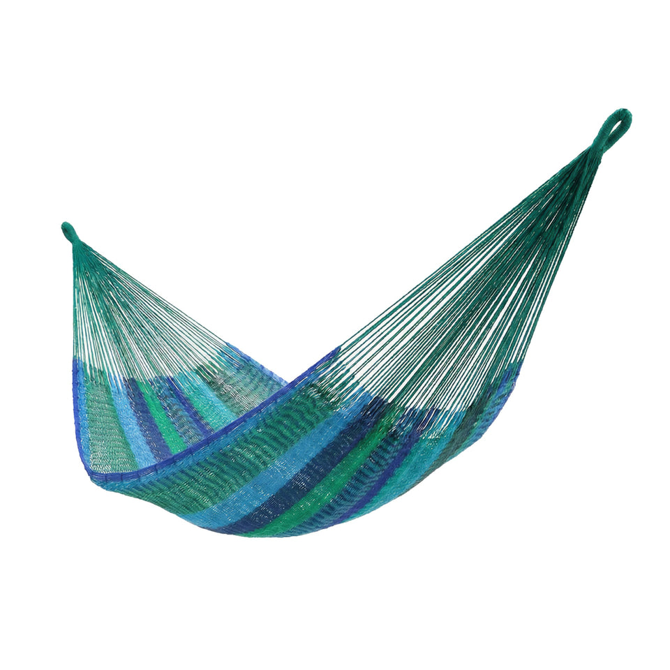 Sunnydaze handwoven XXL Mayan hammock outdoors, roomy for two and enjoyable to lounge.