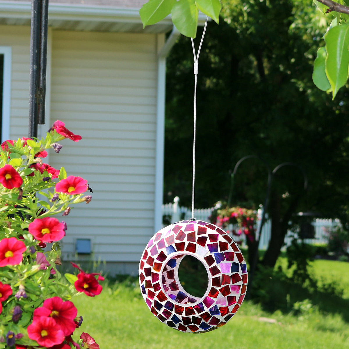 Sunnydaze Outdoor birdwatching feeder in garden setting