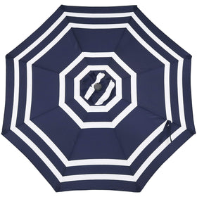 Sunnydaze 9ft navy stripe umbrella on a sunny patio scene