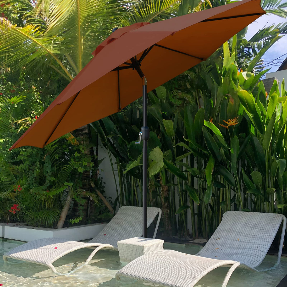 Sunnyglade umbrella shading a 42-54 inch table with seating for 4–6.