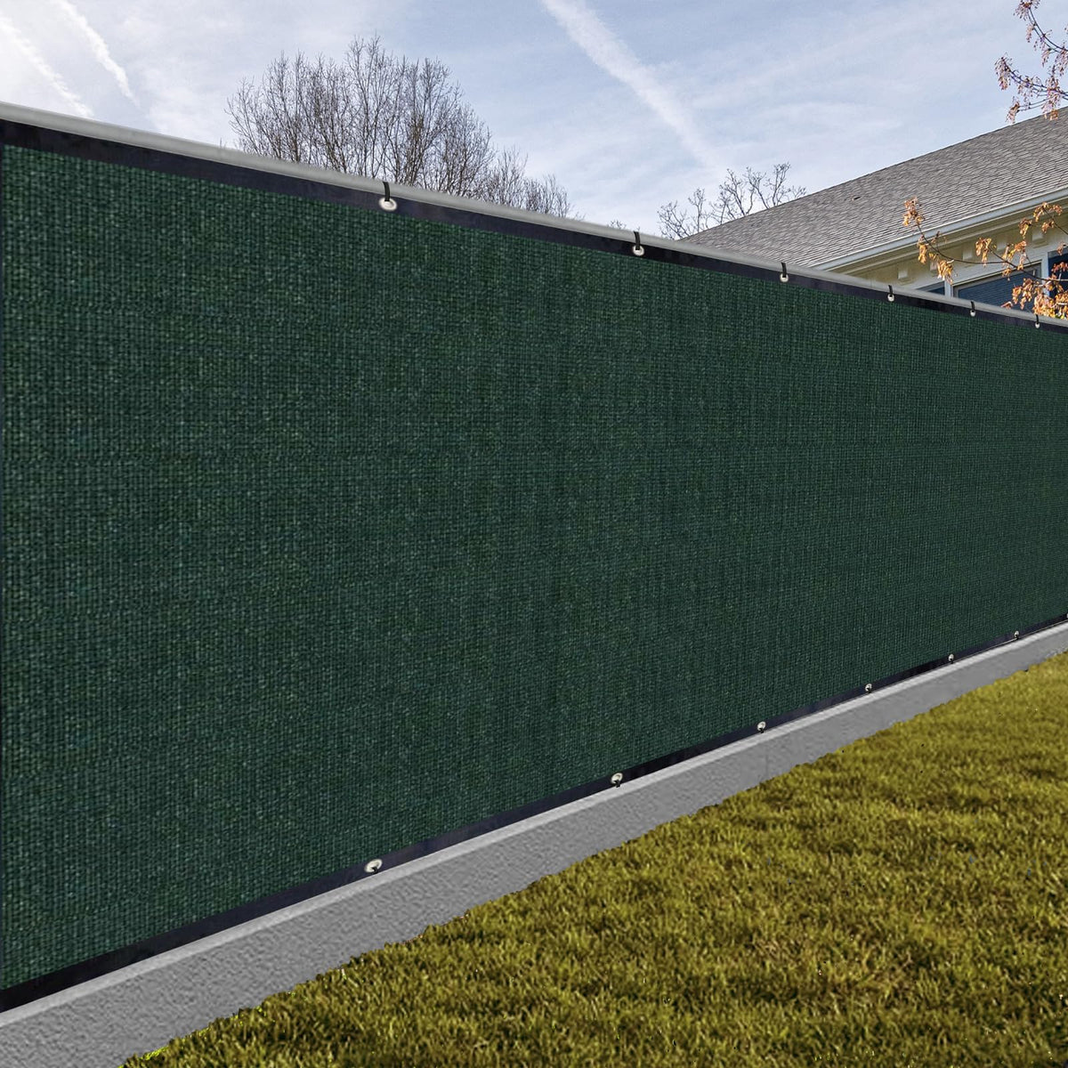 Sunny Guard privacy screen in dark green blocks views while allowing air flow.