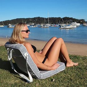 SunnyLiFE chair folded for compact trunk storage and easy packing.