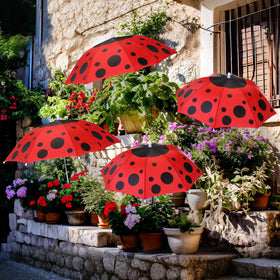 Sunnymove ladybug-pattern plant umbrella shading a potted herb bed for healthier growth