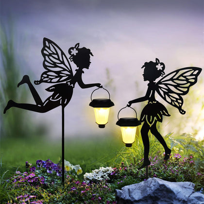 SUNNYPARK solar fairy stake lantern holding glows softly along the path.