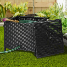 SUNNYPARK weather-resistant hose box in garden setting guards watering gear against rain.