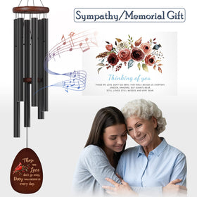 Suntimber wind chimes with engraved memorial words offer serene remembrance.