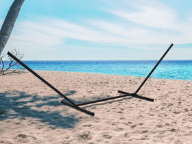 SUPERJARE 450 lb capacity stand supports two-person lounging outdoors.