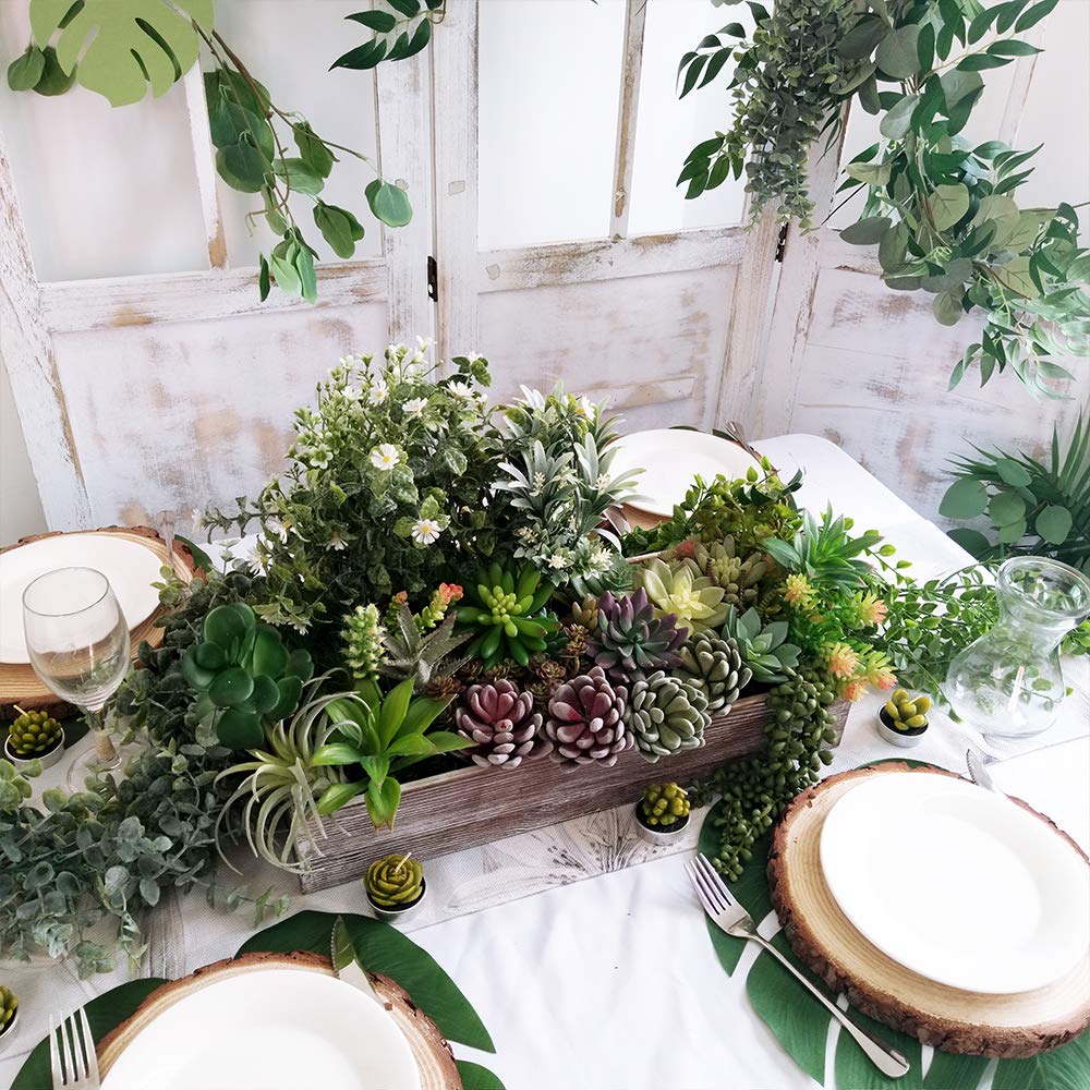 Supla wood planter box filled with succulents creates a natural, minimalist centerpiece.