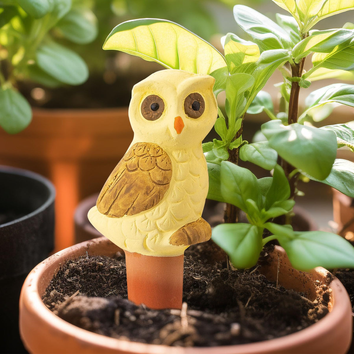 SURE YUESI terracotta owl globes brighten windowsills while delivering continuous moisture