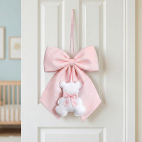Sureio bear and pink bow wall piece makes a cute gift option