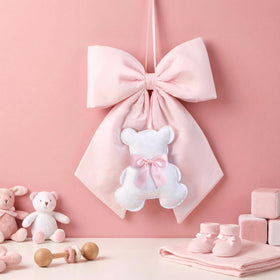 Sureio pink bow decor on door adds welcoming dorm touch