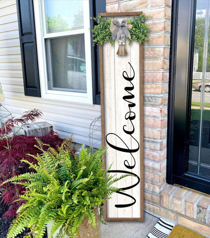 Surfapans welcome sign on a front porch stand enhances curb appeal.