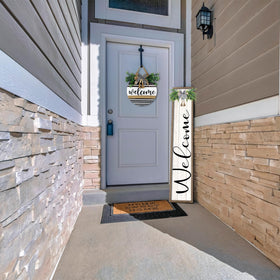 Surfapans wooden sign with eucalyptus decor brings seasonal warmth outdoors.