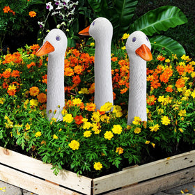 Suzile edge-of-flower bed decor goose accents the yard with character.