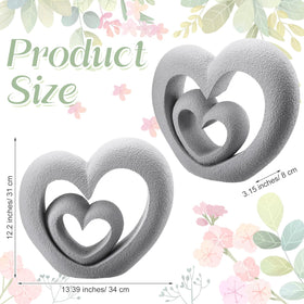 Suzile gray nesting heart statue enhancing a yard with memorial symbolism