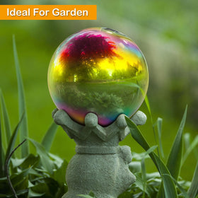 Suzile pond and lawn gazing ball creates visual interest and photography props outside.