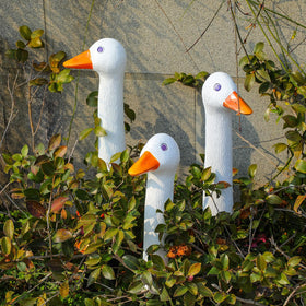 Suzile resin goose yard decor withstands weather with vibrant detail.