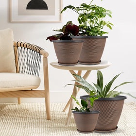 Svxtoby indoor-outdoor planter design blending with various spaces and plants.