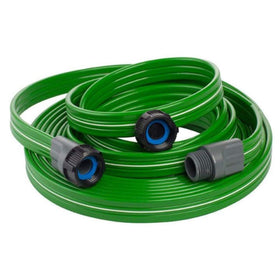 Swan Element Sprinkler Soaker Hose 50ft green used along garden beds for even irrigation.