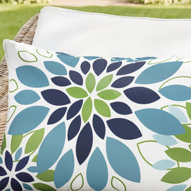 Bright blue-green floral design enhances indoor sofas and outdoor furniture with style.