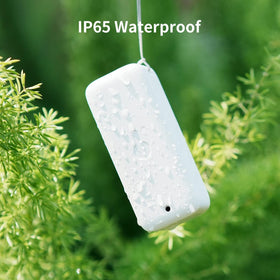 SwitchBot outdoor sensor in IP65 housing monitors durable outdoor conditions.