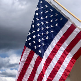 SYII classroom and home display flag for Memorial and national holidays.