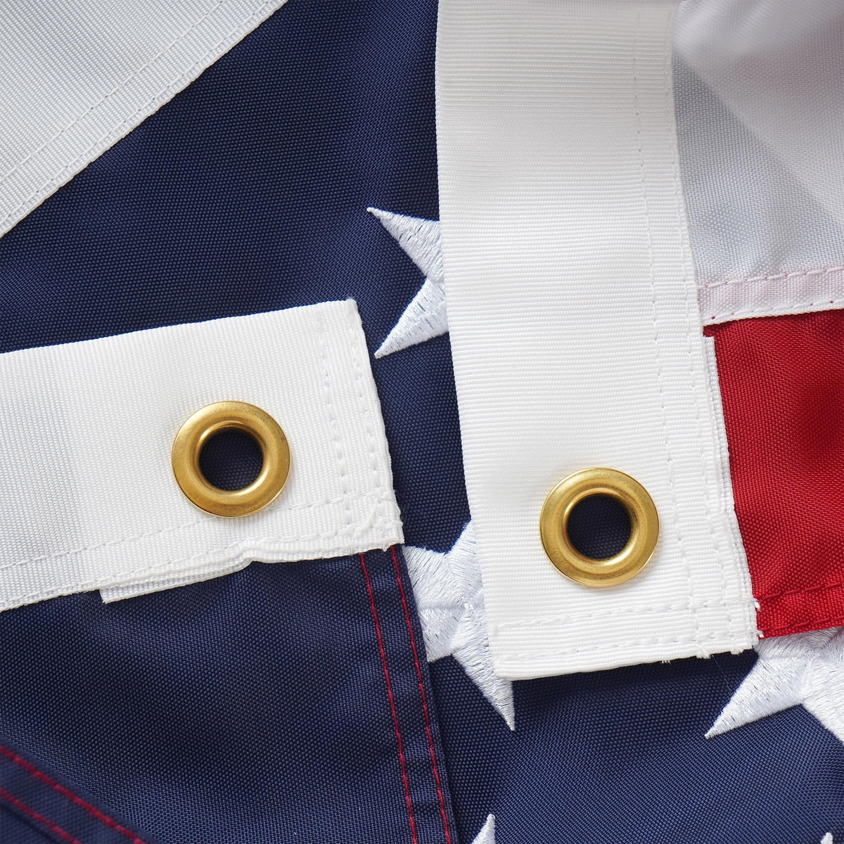 SYII flag with brass grommets for secure hanging.
