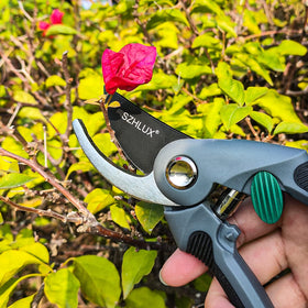 SZHLUX pruning shears curved blade in action delivering precise pruning