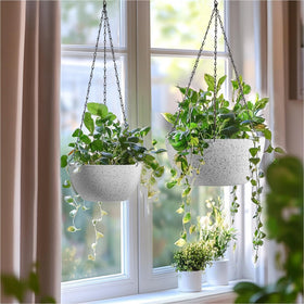 T4U white hanging planter with drainage holes, helps prevent waterlogging.
