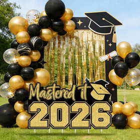TagreSpike Mastered It 2026 Yard Sign on front lawn makes a bold party backdrop