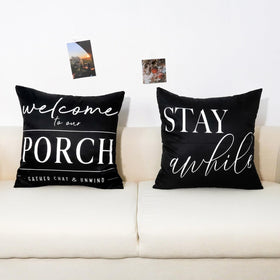TAJWE outdoor pillow cover on garden porch setup with chairs and greenery