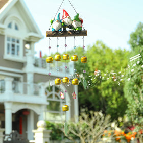 Taman gnomes wind chime with copper bells delivering crisp tones in the garden.