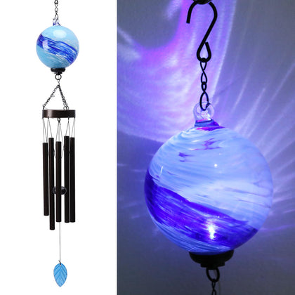 Taman solar wind chime in garden with ambient glow for evenings