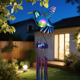 Taman Solar Wind Chime LED globe illuminates night gardens and patios
