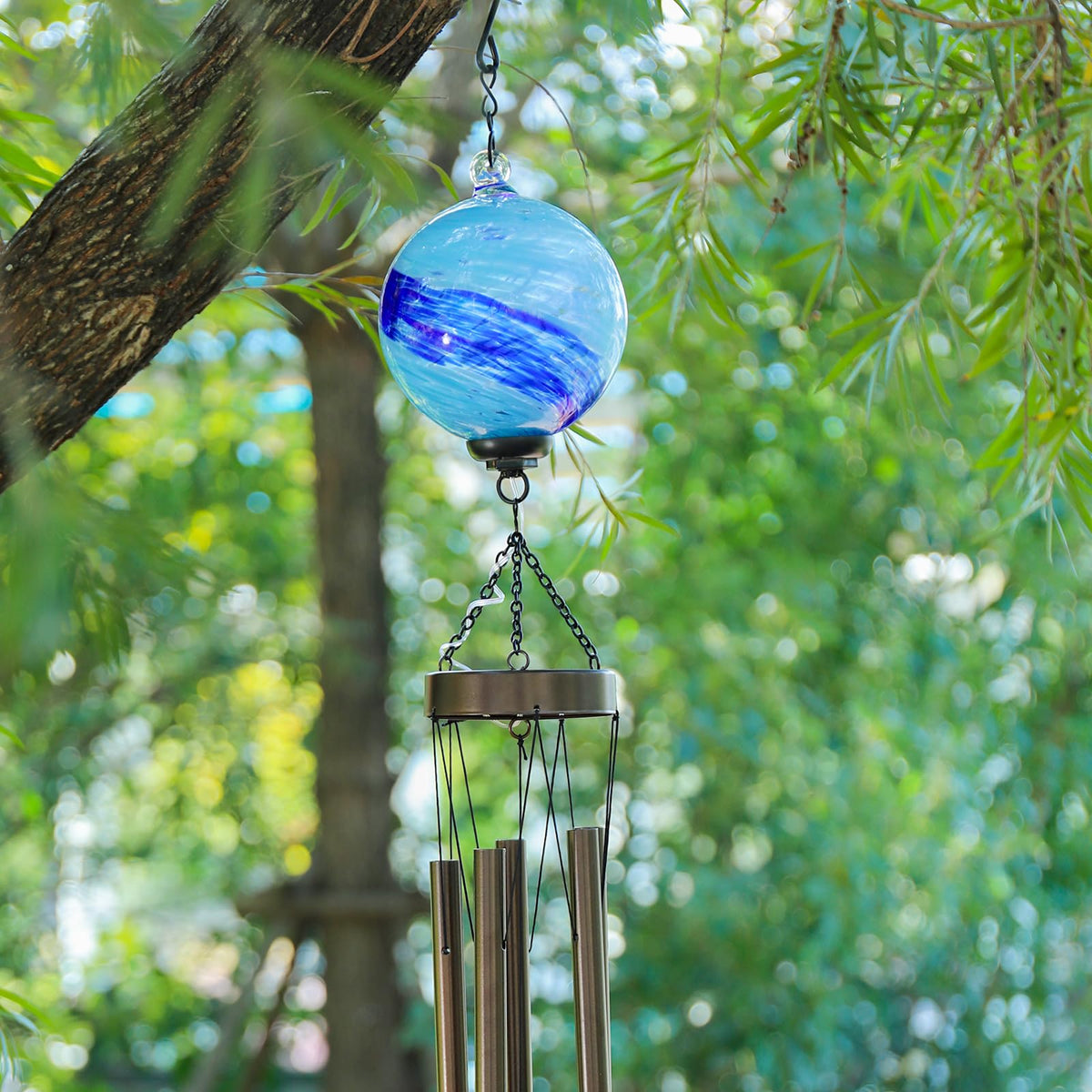 Taman wind chime glows at night with gentle light