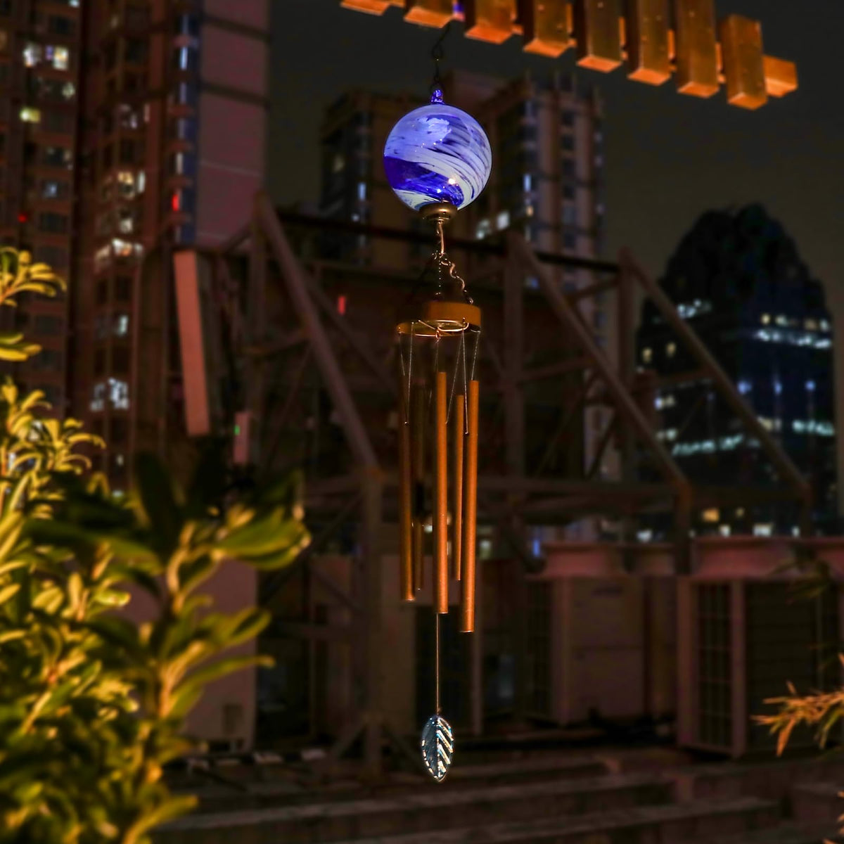 Taman wind chime on patio adds ambient sound