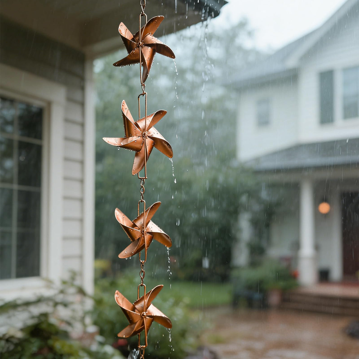 Taman windmill cups copper patina adds rustic charm while directing runoff away from the gutter.