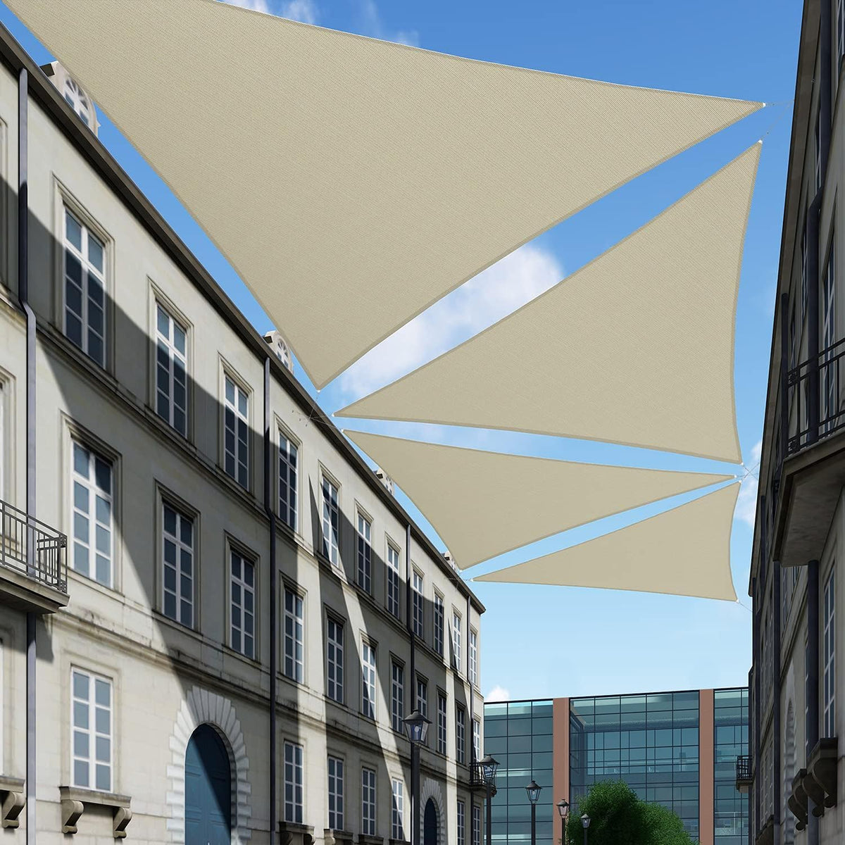 TANG beige triangle shade protects skin from sun while cooling outdoor areas.