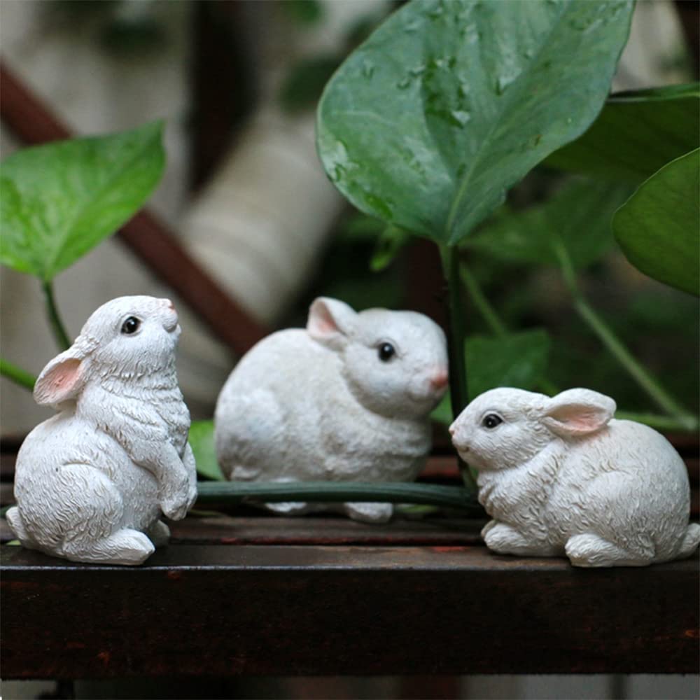 TaTalife resin garden rabbit statues weather-resistant for year-round outdoor use.